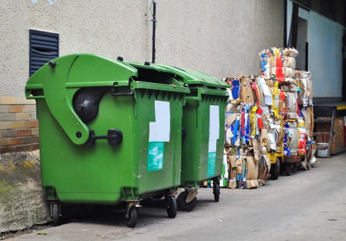 Waste collection truck operating in Paddington streets.